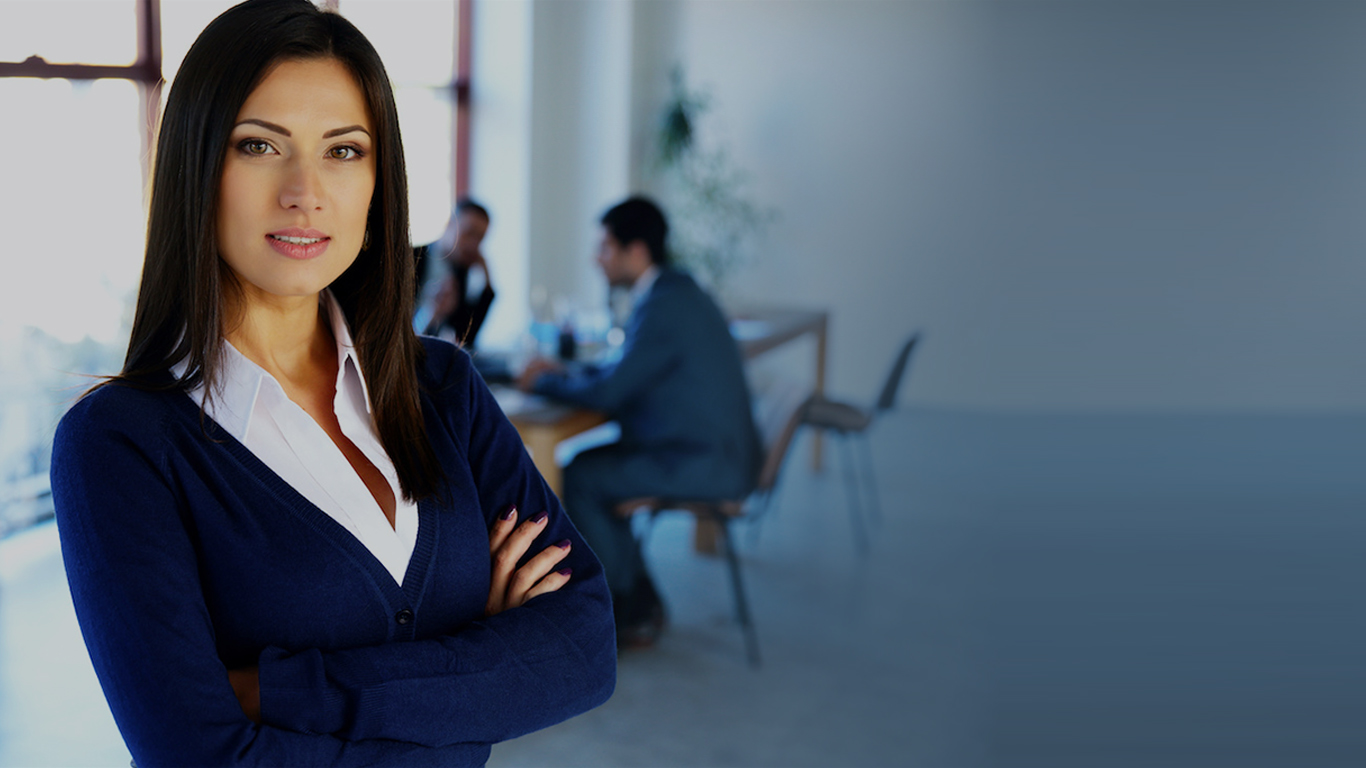 A female working professional posing in office